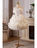 Elegant White Bridal Gown With Off Shoulder Design And Volume Ruffles For Wedding Ceremony