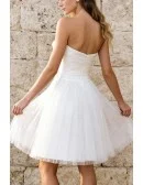 Short Tulle Wedding Gown Featuring Strapless Design And Beaded Belt
