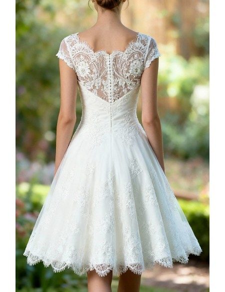 Romantic Ivory Lace Cap Sleeved Wedding Dress Featuring Scalloped Hem