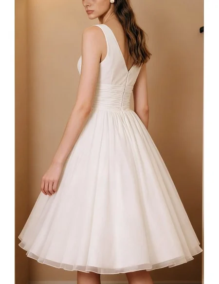 Timeless Ruched Wedding Dress With Sleeveless Design And V Neckline
