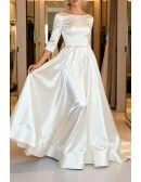 Elegant White Satin Wedding Dress With Backless Design And Long Sleeves