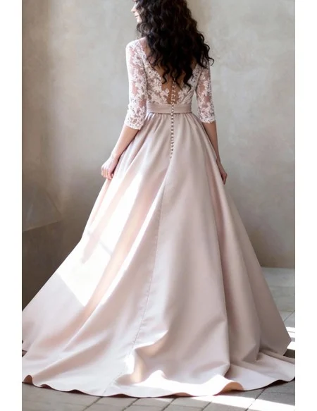 Pale Pink Lace Sleeved Wedding Dress With Lace Bodice And A Line Skirt