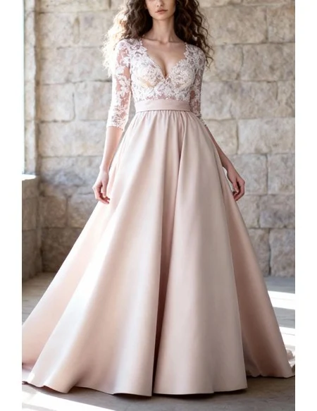 Pale Pink Lace Sleeved Wedding Dress With Lace Bodice And A Line Skirt